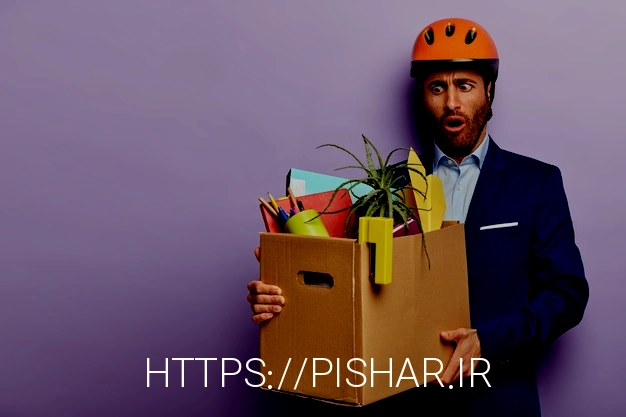 Free photo shocked businessman posing in classy suit and red helmet at the office